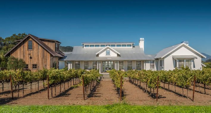 Modern Farmhouse front view with vineyard